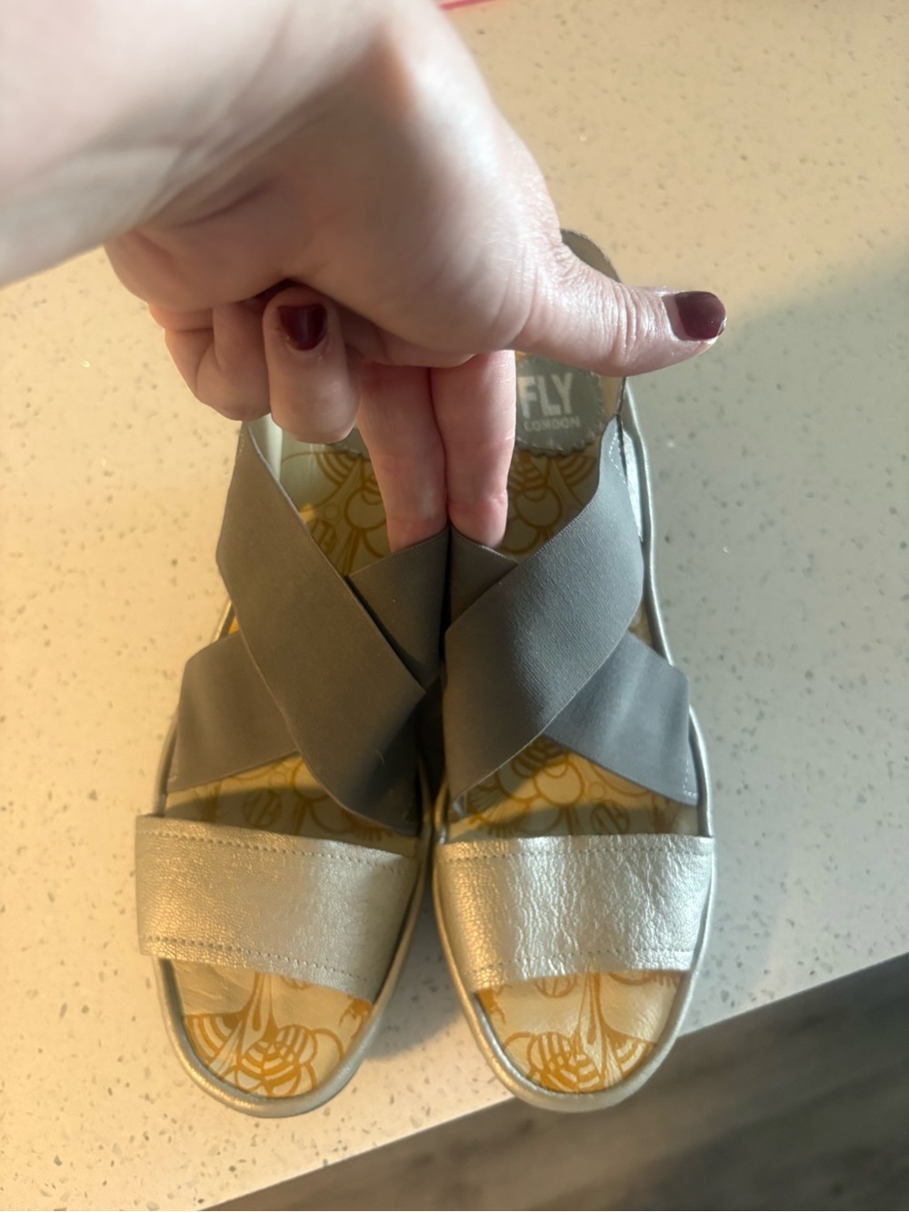 Fly London Women's Gray and Metallic Gold Crisscross Sandals